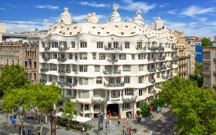 Facade of Casa Mila La Pedrera in Barcelona with unique architectural design.