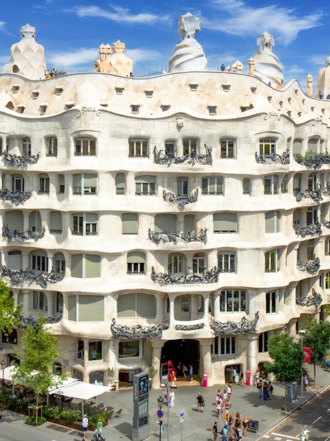 Facade of Casa Mila La Pedrera in Barcelona with unique architectural design.