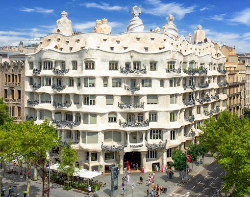 Facade of Casa Mila La Pedrera in Barcelona with unique architectural design.
