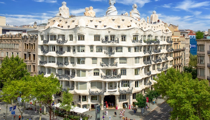Facade of Casa Mila La Pedrera in Barcelona with unique architectural design.