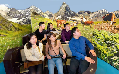 Group enjoying Swiss Chocolate Adventure ride at Museum of Transport, Lucerne.