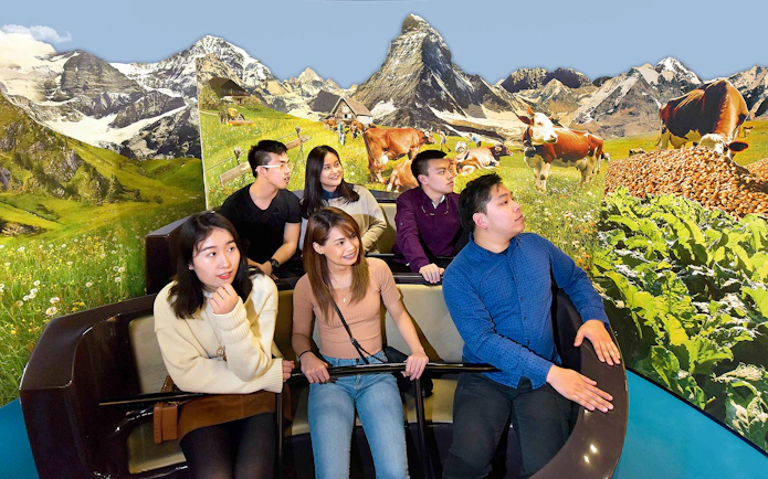 Group enjoying Swiss Chocolate Adventure ride at Museum of Transport, Lucerne.