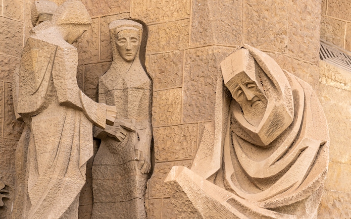Sculpted figures on the facade of Sagrada Familia in Barcelona.