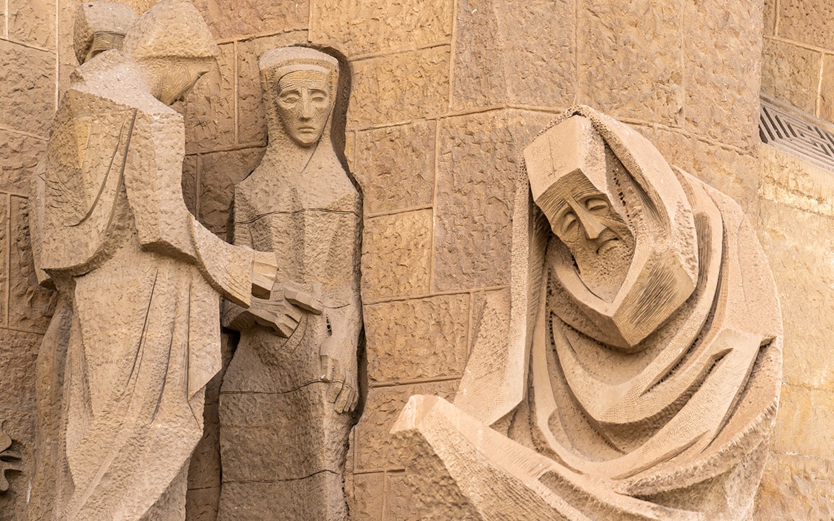 Sculpted figures on the facade of Sagrada Familia in Barcelona.
