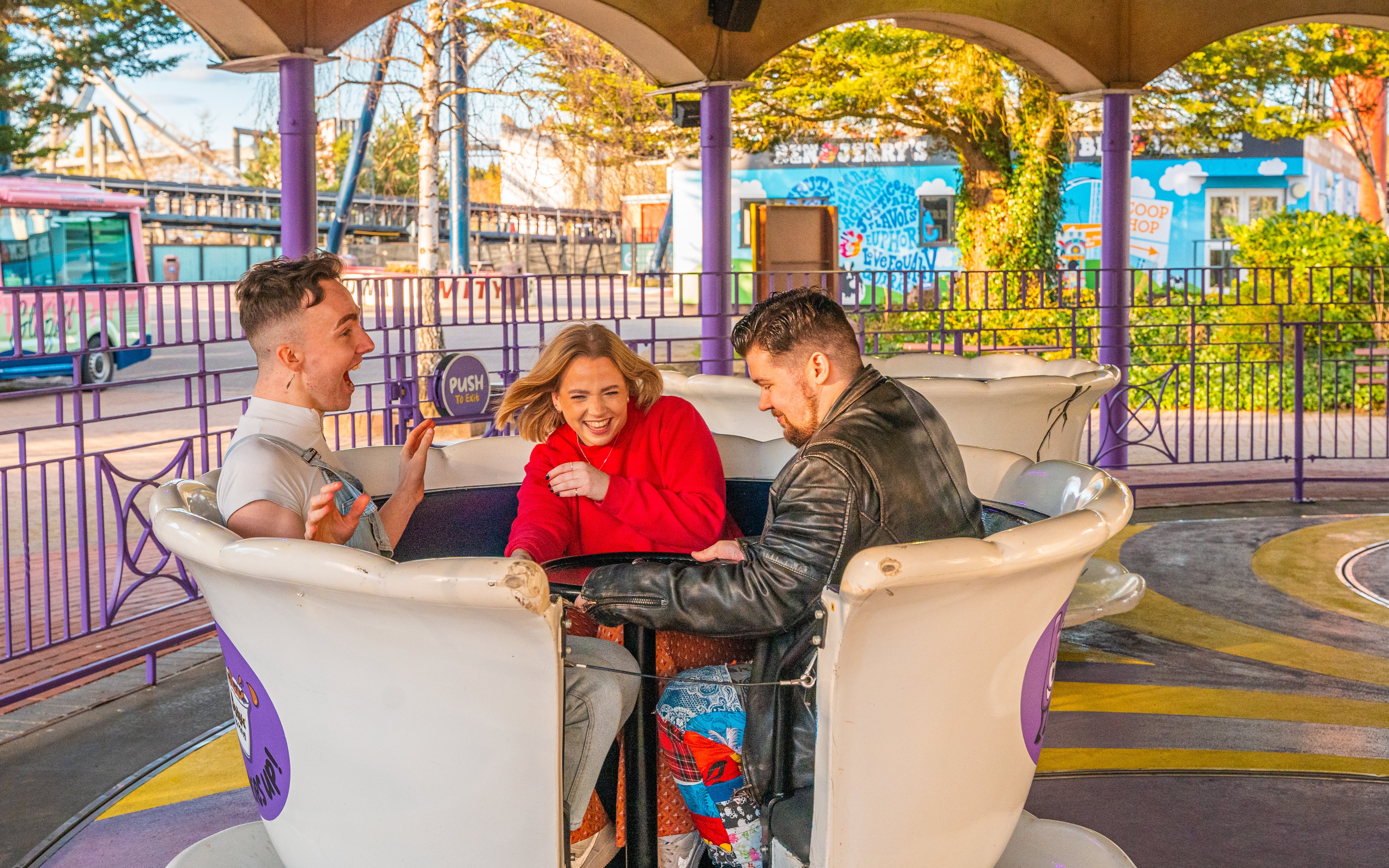 People enjoying a teacup ride at Thorpe Park.