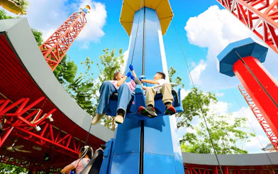 Mother and son enjoying a ride at LEGOLAND Malaysia Theme Park.