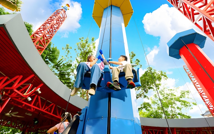 Mother and son enjoying a ride at LEGOLAND Malaysia Theme Park.