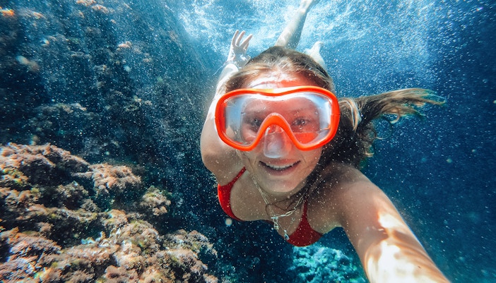 Elaphiti Islands snorkeling at Sunj Beach, Dubrovnik, featuring clear waters and scenic coastline.