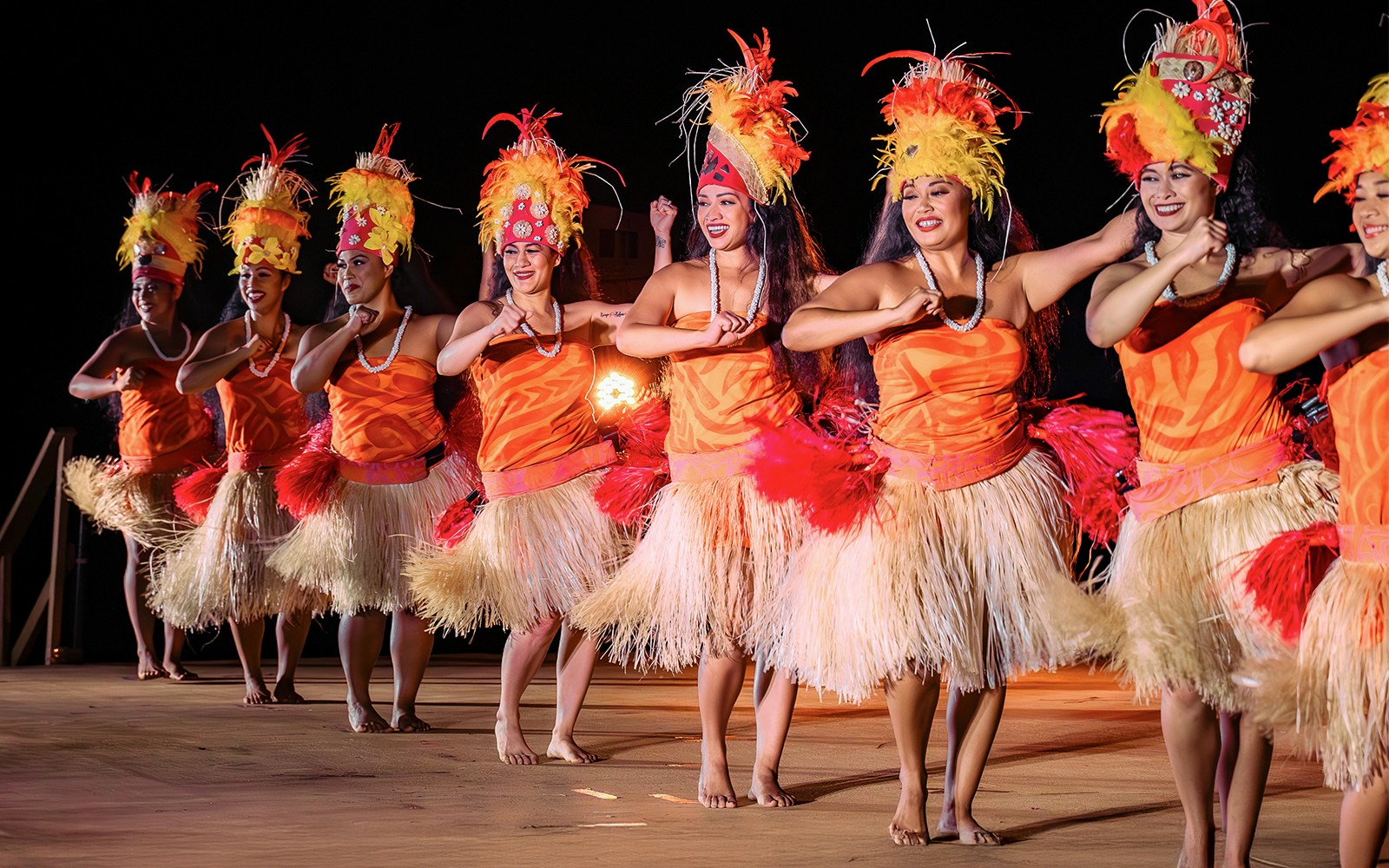 Performers on stage at cultural night show at Mauka Warriors Luau