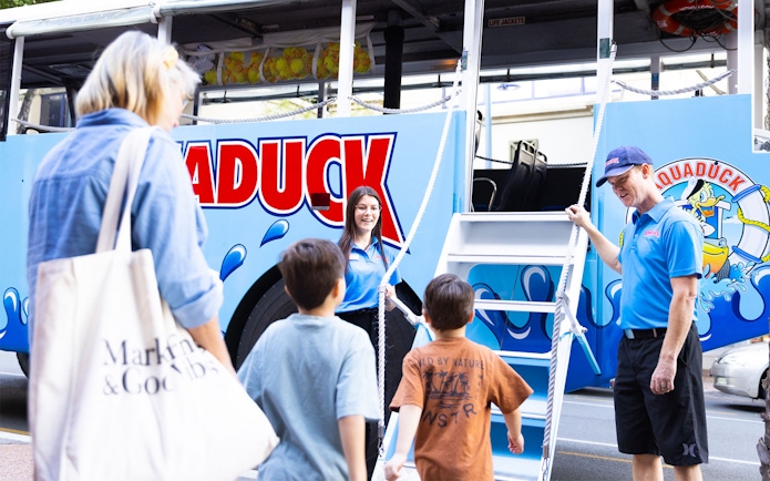Guests boarding Aquaduck vehicle for Sunshine Coast city tour and river cruise.