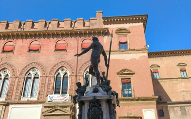 Neptune Fountain statue in front of Palazzo Re Enzo, Bologna.