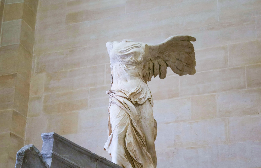 Winged Victory of Samothrace statue at Louvre Museum, Paris.