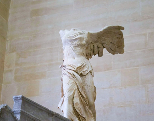 Winged Victory of Samothrace statue at Louvre Museum, Paris.