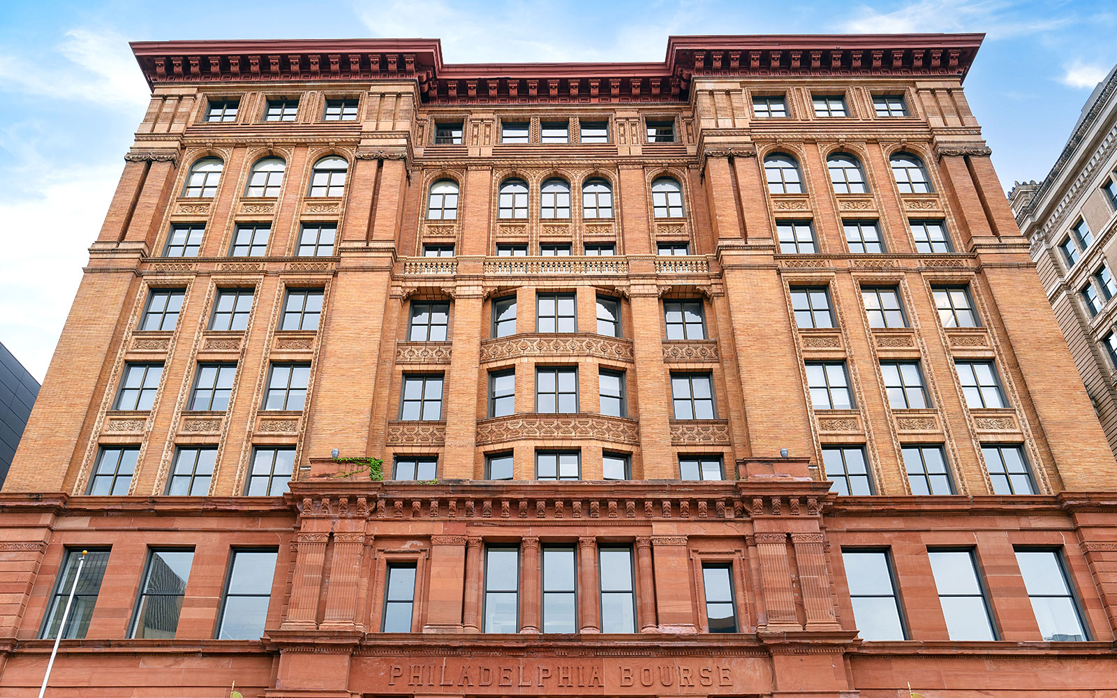Philadelphia Bourse building facade on City Sightseeing Hop-On-Hop-Off Bus Tour.