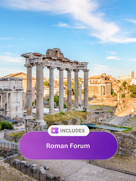 Roman Forum ruins with ancient columns and arches in Rome, Italy.