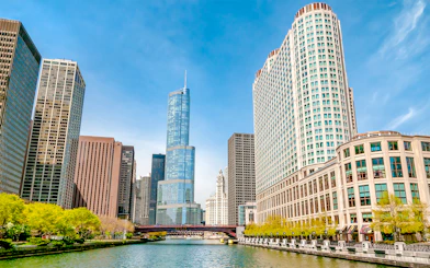 Chicago River with skyline view, featuring modern skyscrapers on a 45min architecture cruise.
