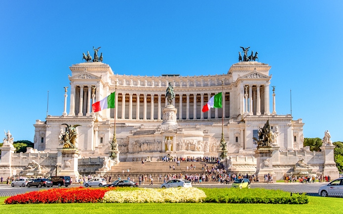 Victor Emmanuel II Monument with Italian flags at Venice Square, Rome.