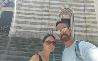 Selfie in front of a historic building in Genoa during the city exploration game.