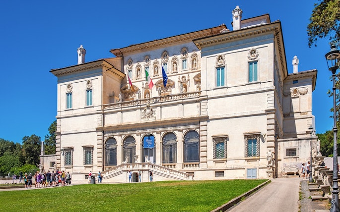 Borghese Gallery exterior with visitors in Rome, Italy.