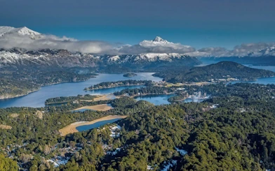 Panoramic view of lakes, forests, and mountains along Circuito Chico route.