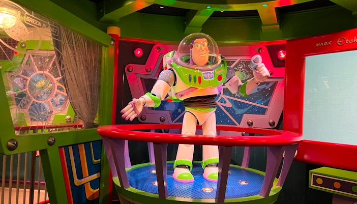 Pixar-themed attractions at Disneyland Paris with colorful characters and rides.
