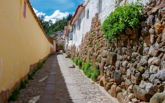 Cobbled street with stone walls in Cuzco, Peru.