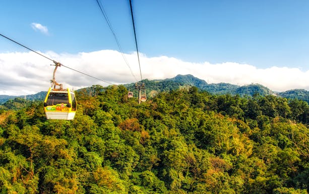 Maokong Gondola over lush green hills in Taipei, Taiwan.