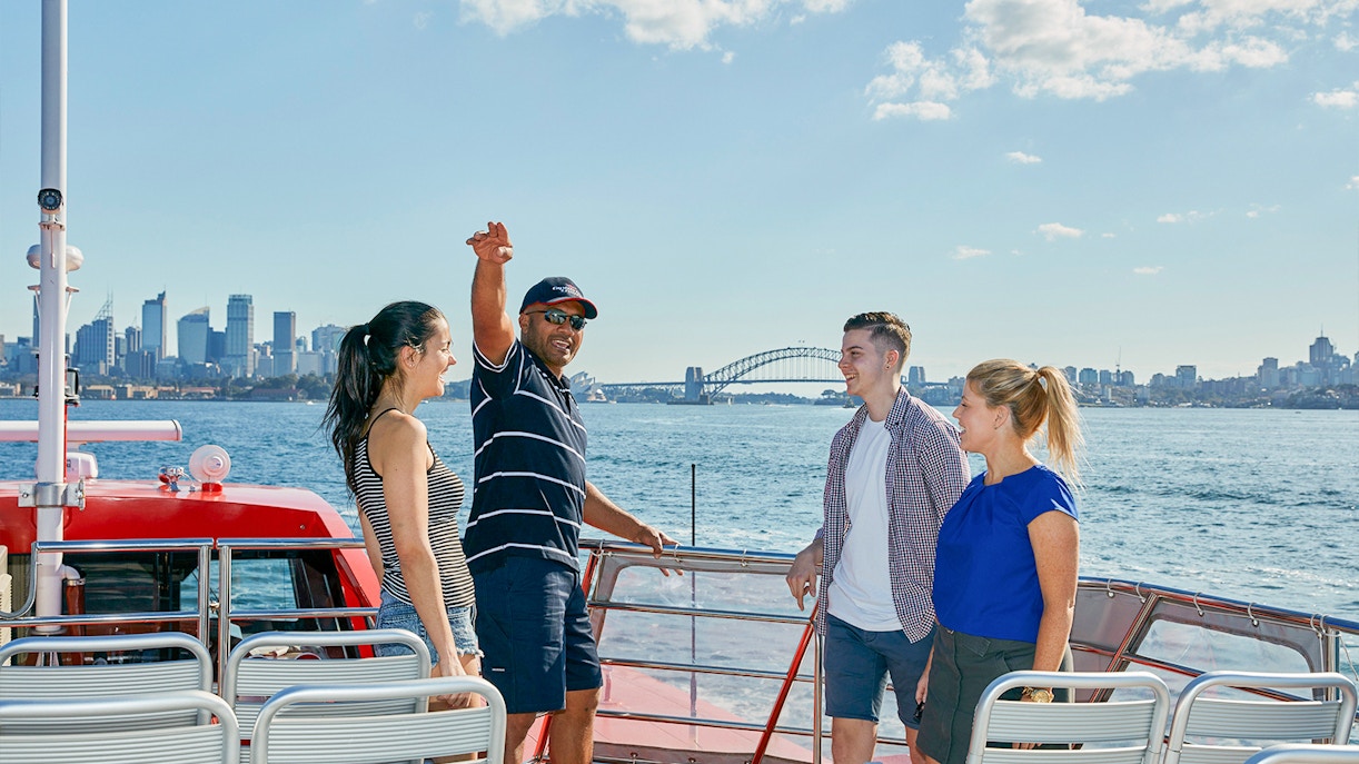 Couple on Captain Cook Sydney Harbour Hop-On-Hop-Off Cruise staff