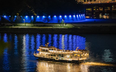 Cruise boat on Han River at night with blue lights, Starlight Cruise, Eland Cruise, Seoul.