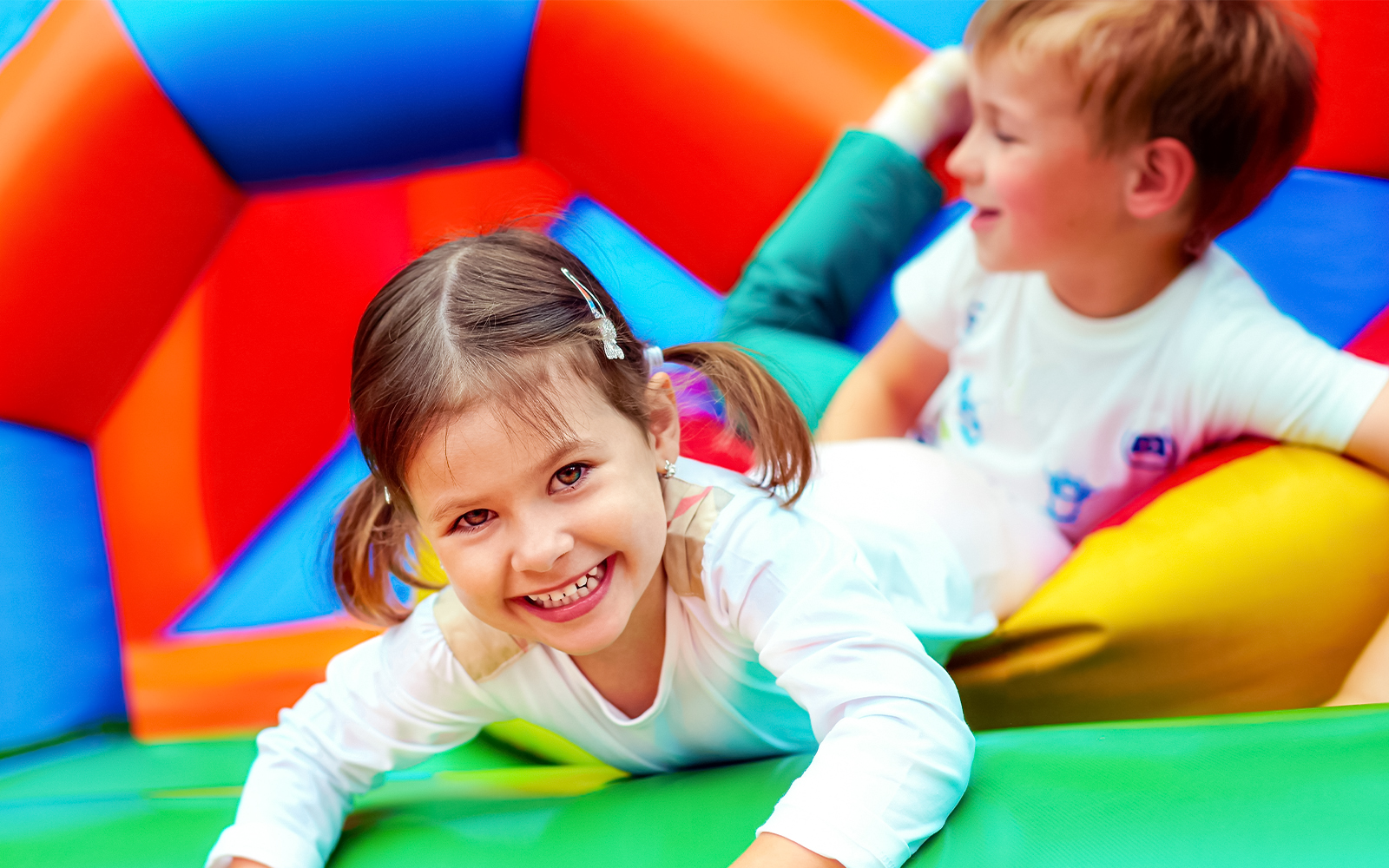 happy kids in bouncy castle