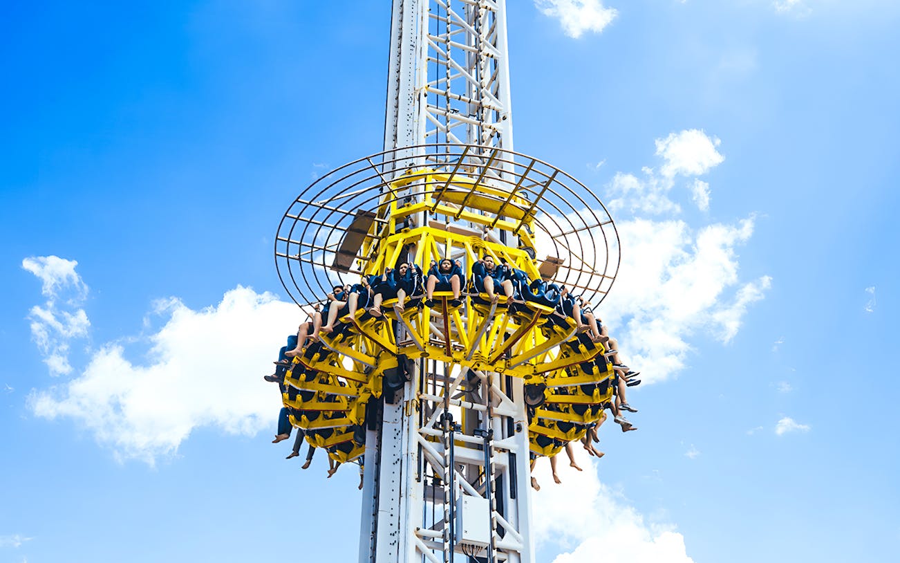 Visitors on a drop tower ride at Vinwonders Nam Hoi An Theme Park.
