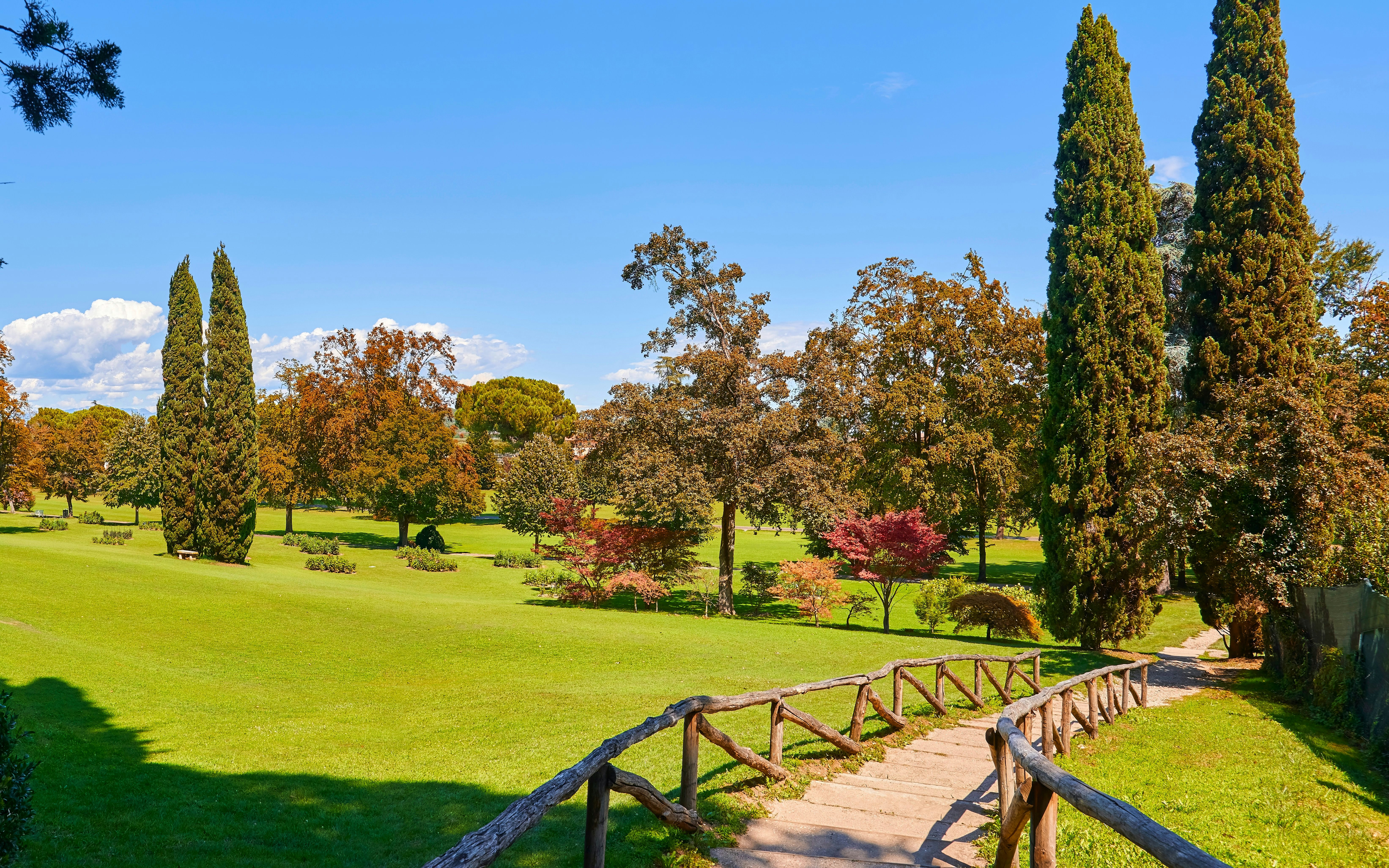 Panoramic view of Parco Giardino Sigurtà with trees and pathway, Valeggio sul Mincio, Italy.