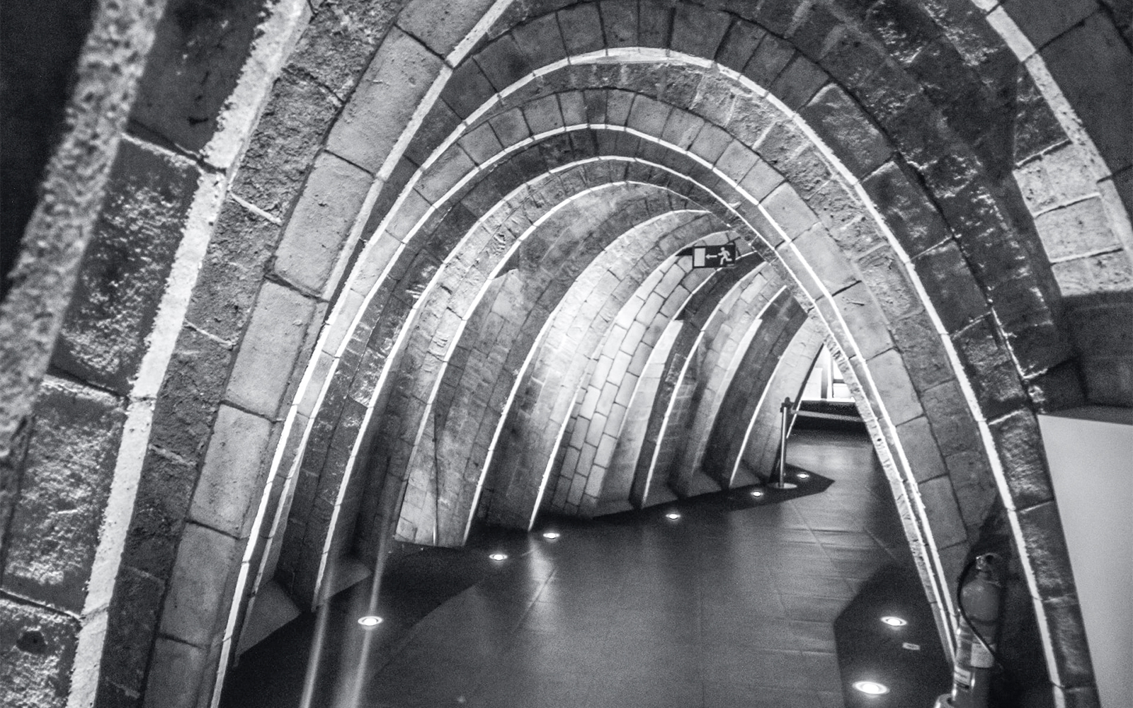 Casa Mila's Whale Attic with unique architectural arches in Barcelona, Spain.