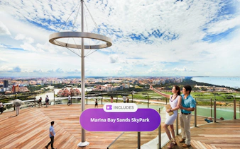 Visitors on Marina Bay Sands SkyPark Observation Deck, overlooking Singapore cityscape.