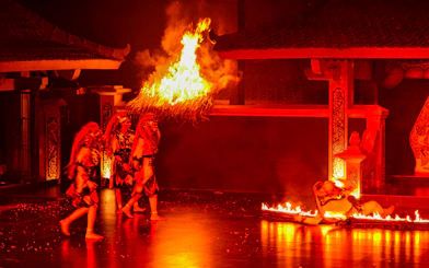 Traditional Indonesian performers in a fiery Ramayana Ballet scene.