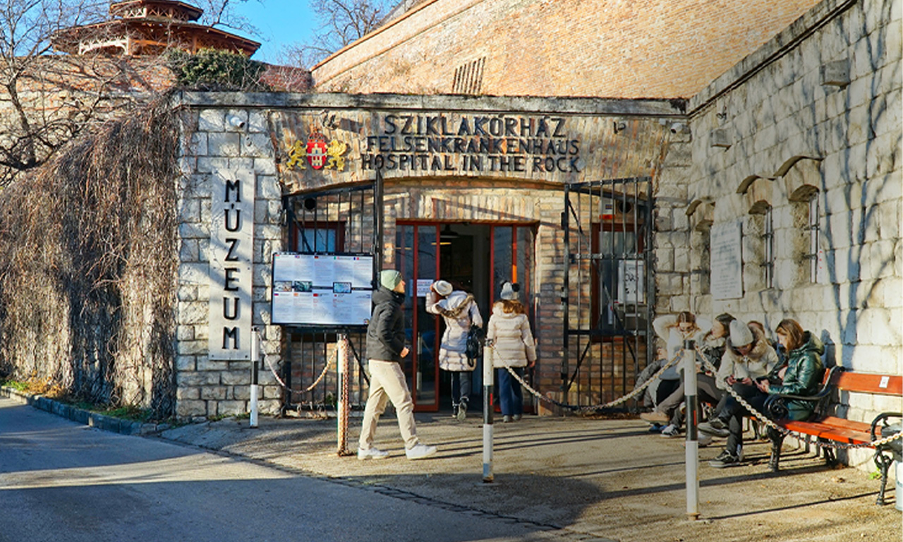 Visitors entering the Rock Nuclear Bunker Museum in Budapest.