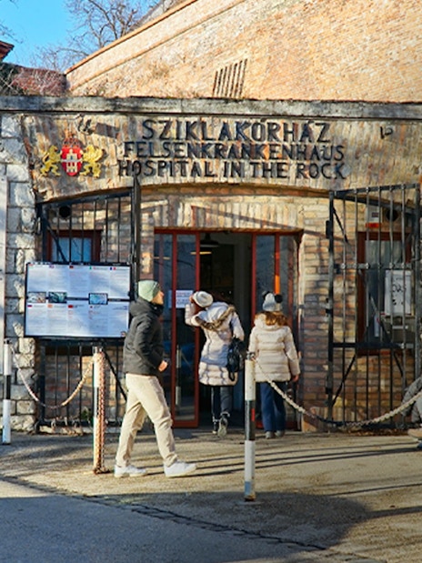 Visitors entering the Rock Nuclear Bunker Museum in Budapest.