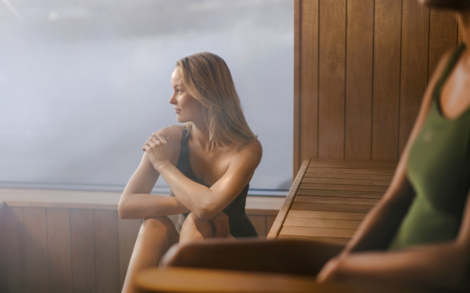 Guests enjoying the sauna inside Laugarás Lagoon.