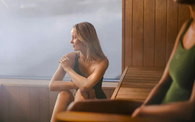 Guests enjoying the sauna inside Laugarás Lagoon.