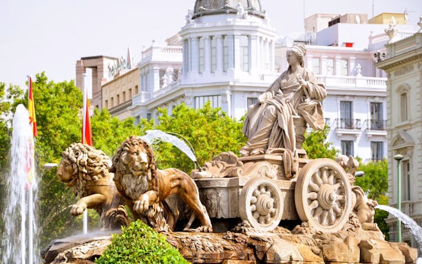 Cibeles Fountain with lions and goddess statue in Madrid, near Prado Museum.