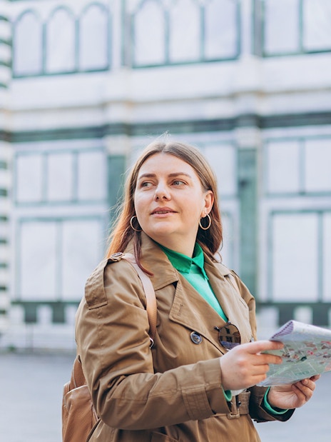 Female guide with map at Duomo Complex, Florence.