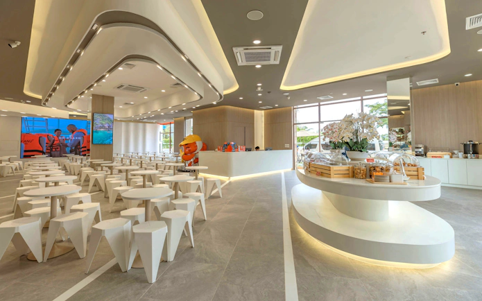 Modern waiting area for Phuket: Phi Phi & Khai Islands speedboat tour with seating and refreshments.
