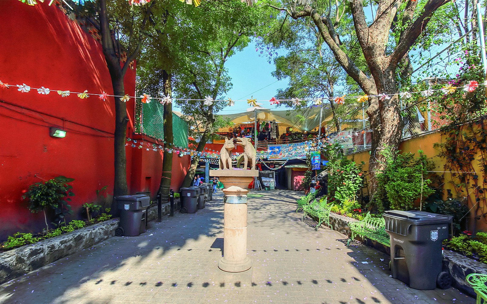 Artisan crafts displayed at a vibrant market in Coyoacan, Mexico.
