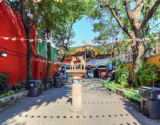 Artisan crafts displayed at a vibrant market in Coyoacan, Mexico.