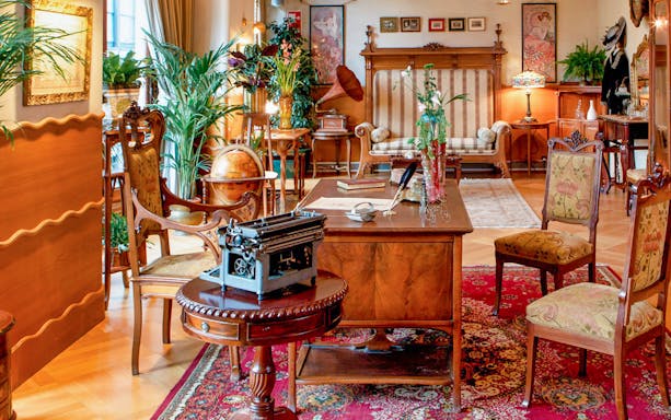 Casa Batlló interior with vintage furniture and decor in Barcelona.