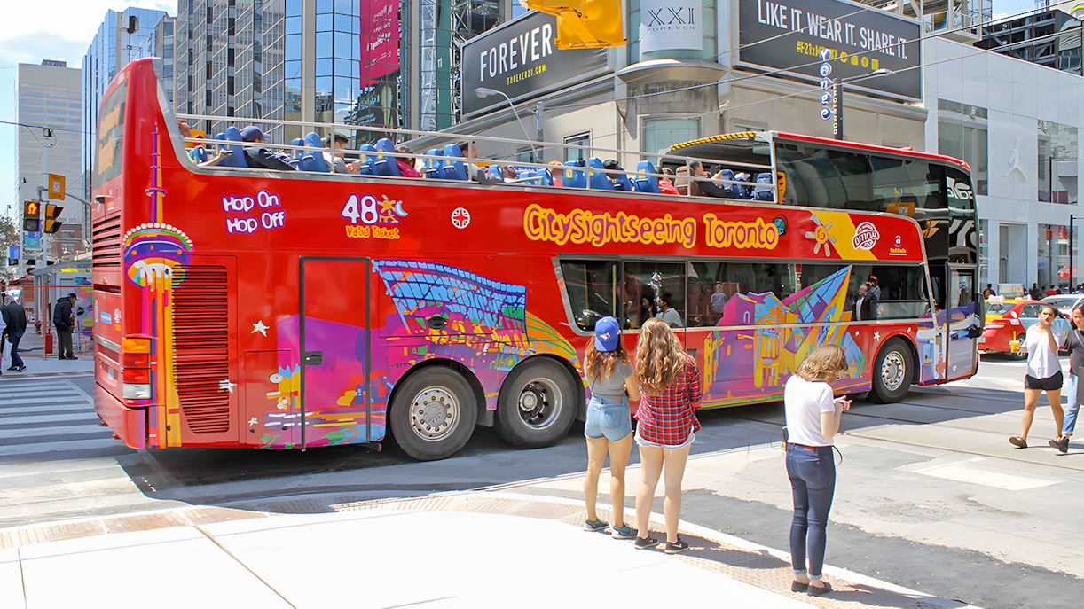 tourists enjoying on City Sightseeing Toronto Hop-on Hop-off bus tour