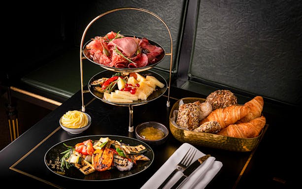 Assorted meats, cheeses, and pastries served at Café Wintergarten breakfast.