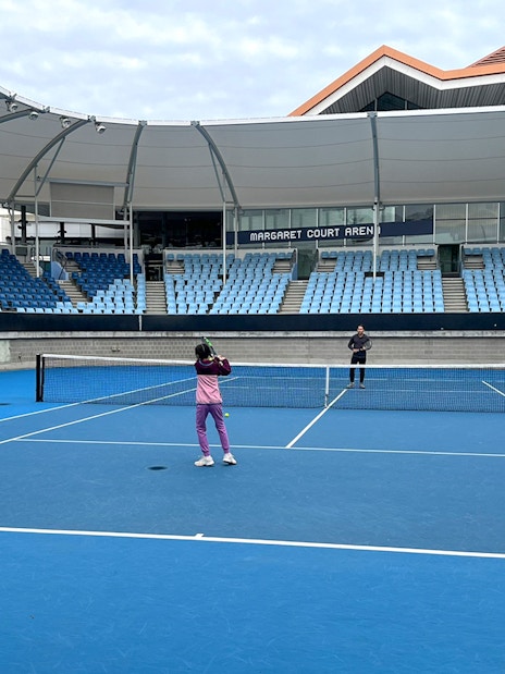Tennis players on court at Margaret Court Arena, Melbourne Park.
