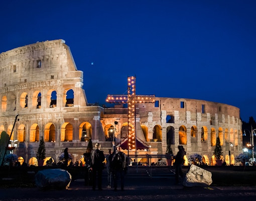Pope Francis leads Via Crucis torchlight procession at Colosseum, Rome, on Good Friday.