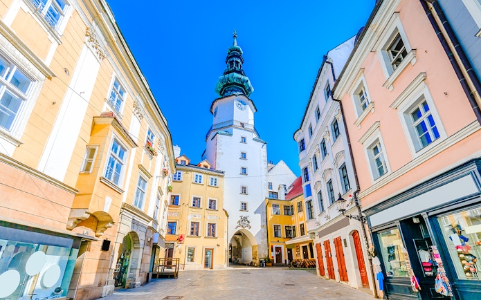 Michael's Gate in Bratislava's Old Town, surrounded by historic buildings.